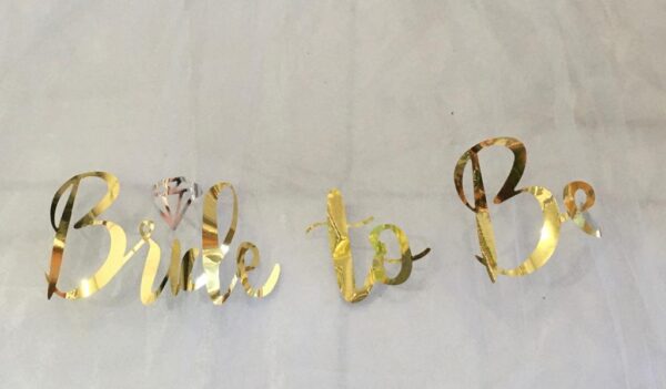 white bride to be veil with gold lettering