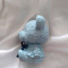 light blue bear shaped candle