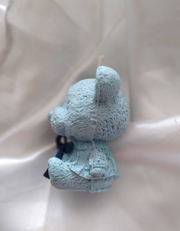 light blue bear shaped candle