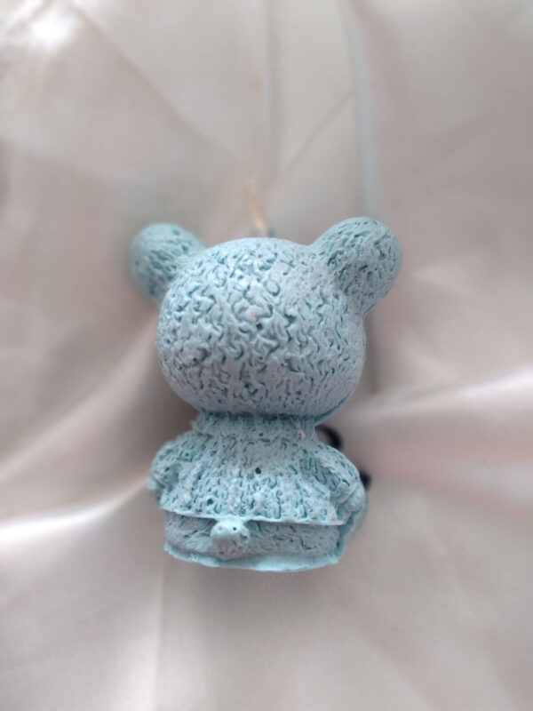 light blue bear shaped candle