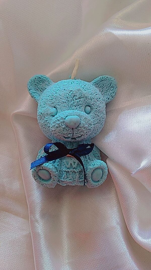 light blue bear shaped candle