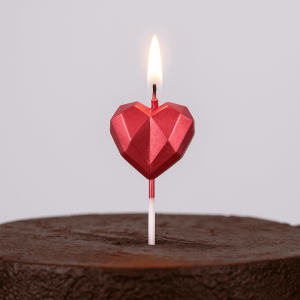lit up heart candle
