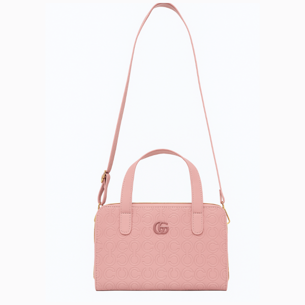 pink handbag with shoulder strap